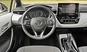 Toyota Corolla vs. Toyota Prius v MPG
