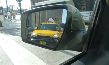 Kia Soul Photos: Kia Soul taxi cab in Soul rear view mirror