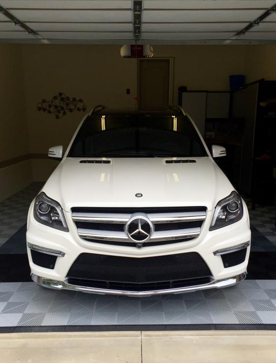 2015 Mercedes-Benz GL 550 is Designo diamond white.