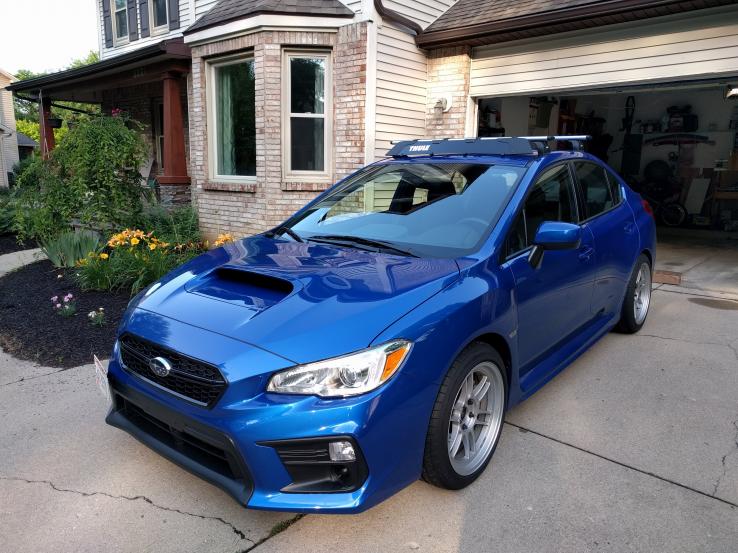 Thule OEM roof rack installed, Enkei RPF1 wheels